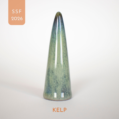 Green ceramic cone-shaped ring holder labeled 'Kelp' with 'SSF 2026' on a white background